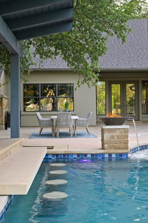 209 Ridge View Dr, Georgetown, TX 78628 - outdoor pool with a patio area and french doors