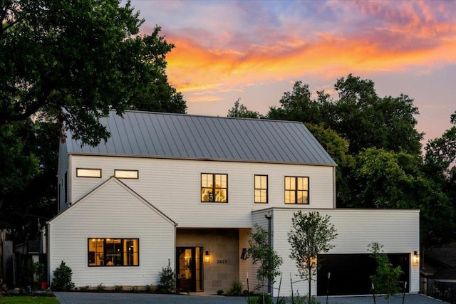 2625 Exposition Blvd, Austin, TX 78703 - view of front of home featuring driveway and metal roof