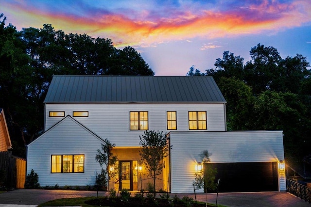 2625 Exposition Blvd, Austin, TX 78703 - view of front of home with driveway and metal roof