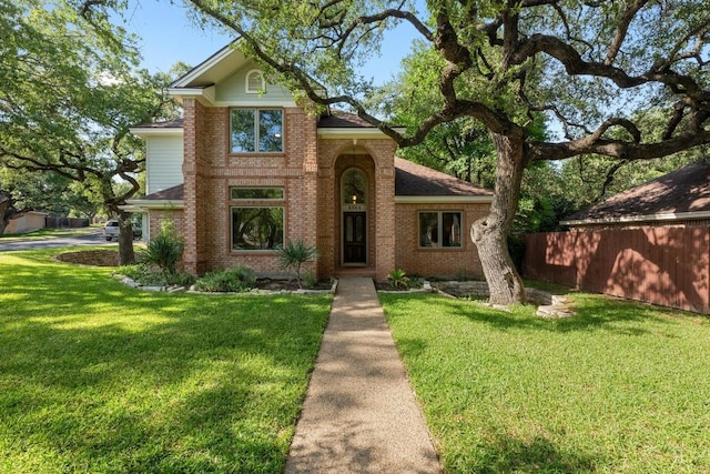 6304 John Chisum Ln, Austin, TX 78749 - traditional-style house featuring brick siding and roof with shingles