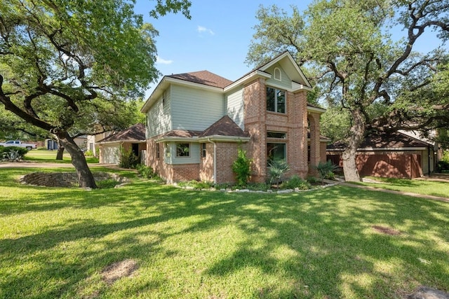 6304 John Chisum Ln, Austin, TX 78749 - view of front facade with brick siding and a front yard