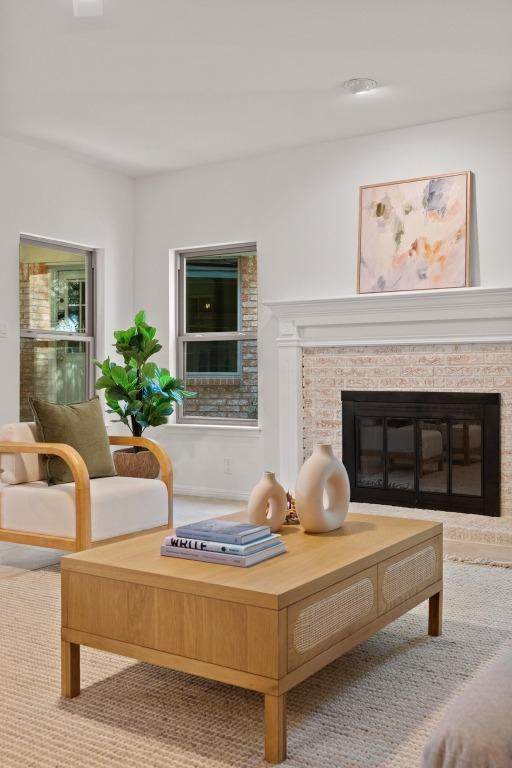 6304 John Chisum Ln, Austin, TX 78749 - sitting room featuring a glass covered fireplace
