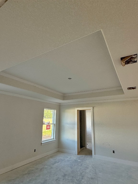 108 Aidan Ct, Burnet, TX 78611 - unfurnished bedroom featuring a raised ceiling, ornamental molding, and baseboards