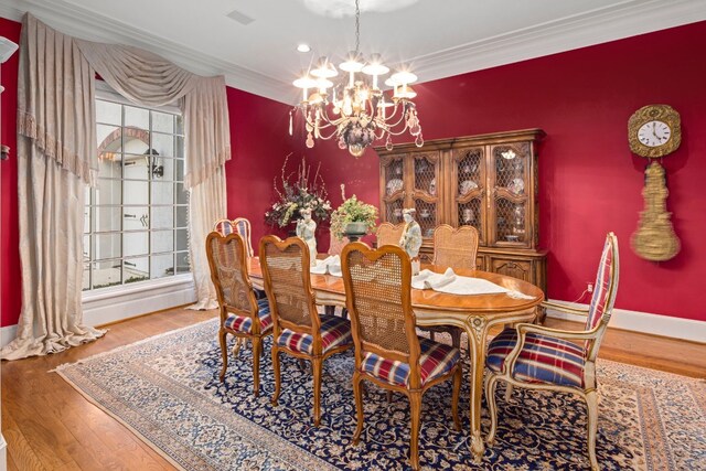 124 Florentine, Horseshoe Bay, TX 78657 - dining room with a chandelier, crown molding, baseboards, and wood finished floors