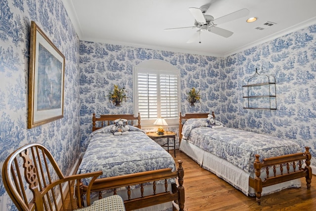 124 Florentine, Horseshoe Bay, TX 78657 - bedroom featuring wood finished floors, ornamental molding, ceiling fan, and recessed lighting