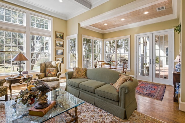 124 Florentine, Horseshoe Bay, TX 78657 - sunroom / solarium featuring french doors, wood finished floors, plenty of natural light, recessed lighting, and ornamental molding
