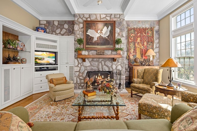 124 Florentine, Horseshoe Bay, TX 78657 - living room with plenty of natural light, ornamental molding, a fireplace, and wood finished floors