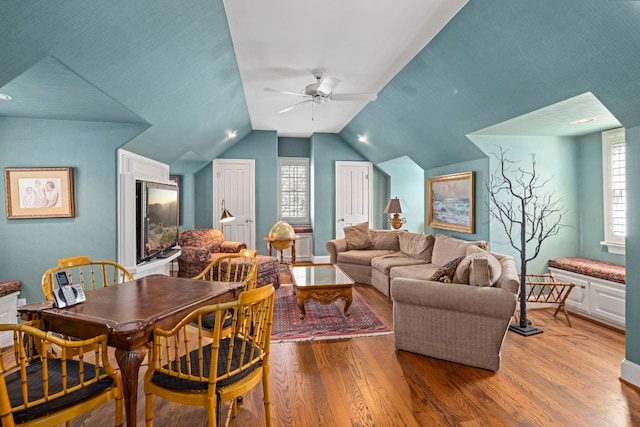124 Florentine, Horseshoe Bay, TX 78657 - living area featuring a ceiling fan, wood finished floors, plenty of natural light, and vaulted ceiling