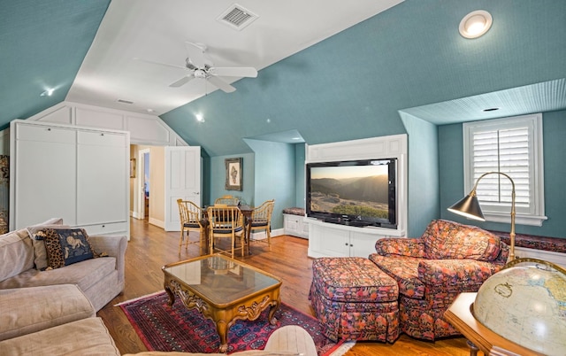 124 Florentine, Horseshoe Bay, TX 78657 - living area featuring vaulted ceiling, wood finished floors, and a ceiling fan