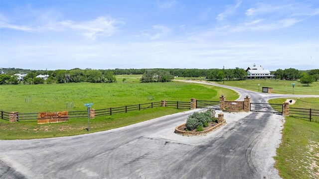 2124 Crabapple Rd, Blanco, TX 78606 - view of road featuring a gate and a view of rural / pastoral area