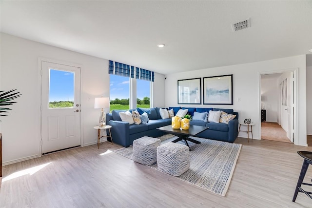 1006 Antelope Trl, Temple, TX 76504 - living area with light wood-type flooring, baseboards, and recessed lighting