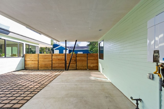 view of patio / terrace featuring fence