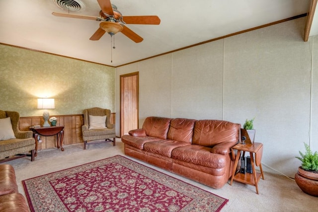 508 Lee St N, Round Rock, TX 78664 - carpeted living room with ceiling fan, vaulted ceiling, and ornamental molding