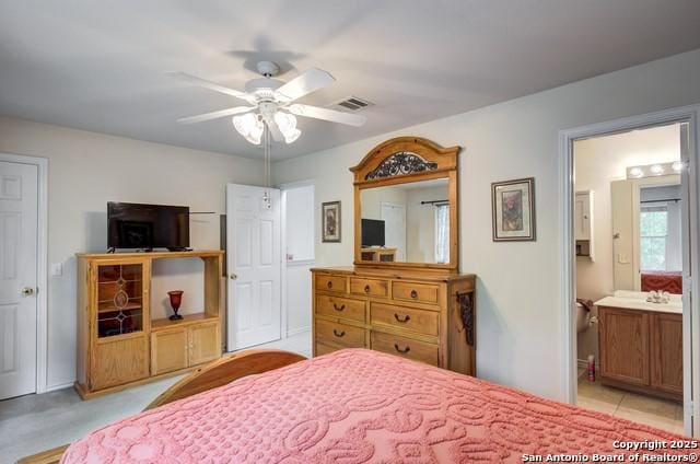 5659 Fergus Unit A, Kyle, TX 78640 - bedroom featuring ensuite bath and a ceiling fan