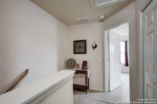 5659 Fergus Unit A, Kyle, TX 78640 - corridor with attic access and light carpet