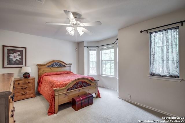 5659 Fergus Unit A, Kyle, TX 78640 - bedroom featuring carpet flooring and a ceiling fan