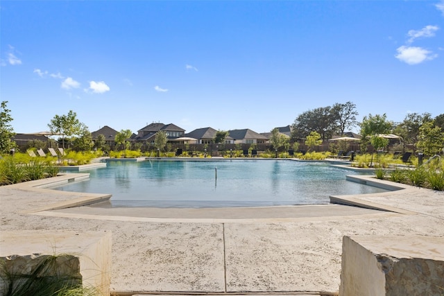 192 Grand Canyon Way, Kyle, TX 78640 - community pool featuring a residential view