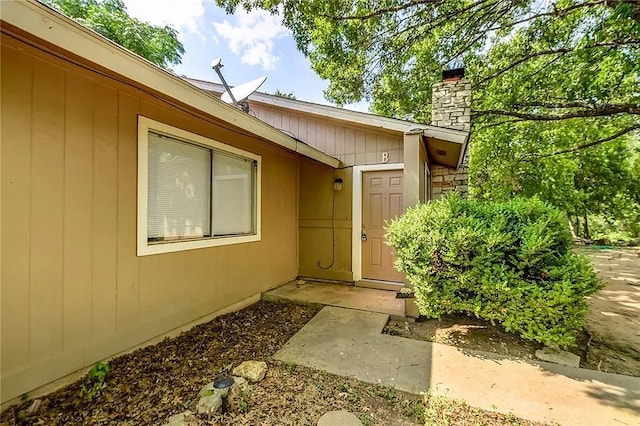 10400 Burmaster Ln Unit A, Austin, TX 78750 - property entrance featuring a chimney