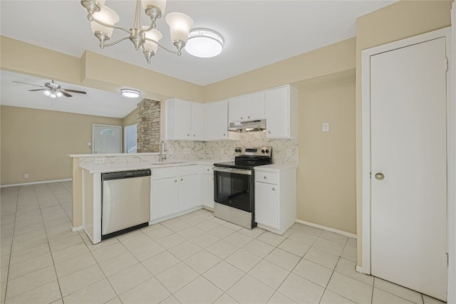10400 Burmaster Ln Unit A, Austin, TX 78750 - kitchen with appliances with stainless steel finishes, under cabinet range hood, light countertops, backsplash, and white cabinetry