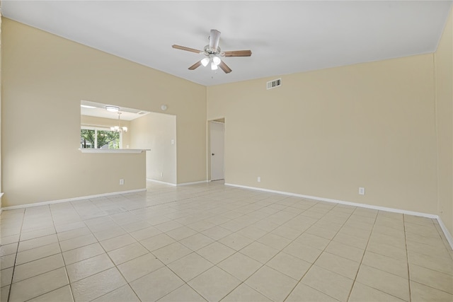 10400 Burmaster Ln Unit A, Austin, TX 78750 - unfurnished room featuring a ceiling fan, baseboards, a chandelier, and light tile patterned flooring