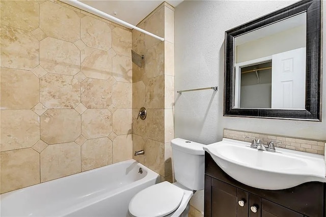 10400 Burmaster Ln Unit A, Austin, TX 78750 - full bath featuring vanity, toilet,  shower combination, and a textured wall
