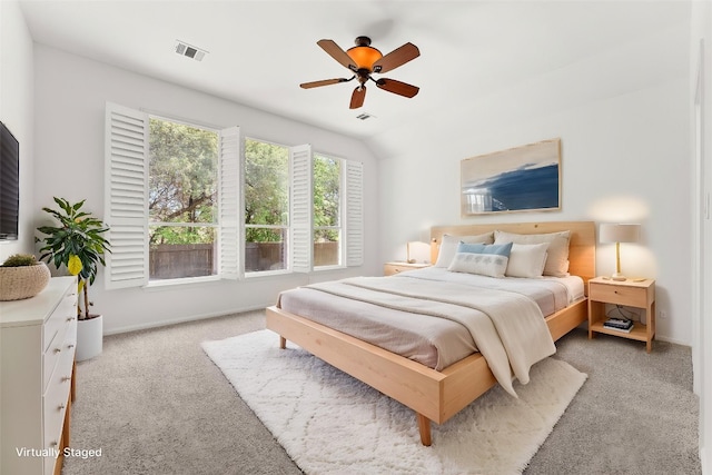 12501 Rush Creek Ln, Austin, TX 78732 - bedroom featuring light colored carpet, baseboards, and a ceiling fan