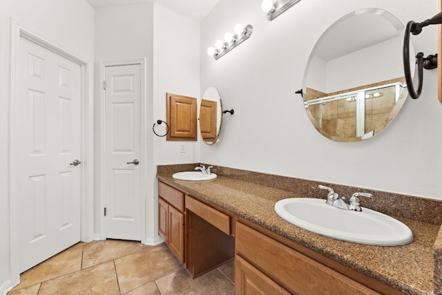 12501 Rush Creek Ln, Austin, TX 78732 - full bathroom featuring double vanity, a tile shower, and tile patterned floors