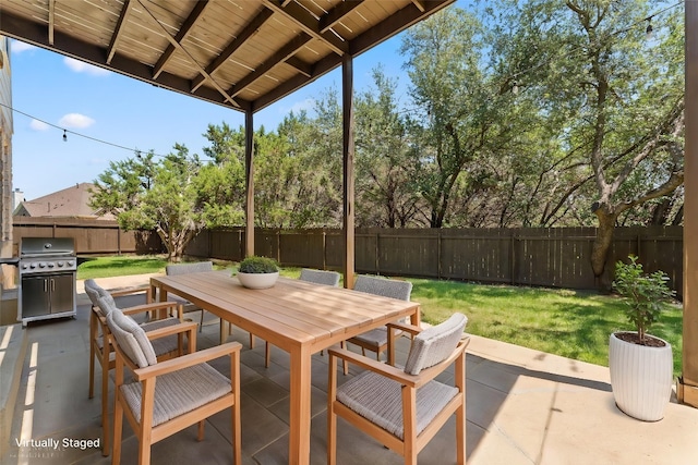 12501 Rush Creek Ln, Austin, TX 78732 - view of patio with outdoor dining space and area for grilling