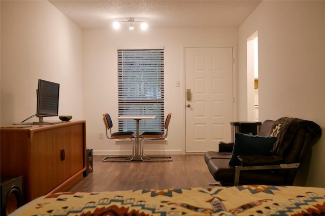 4701 Red River St Unit 104, Austin, TX 78751 - bedroom with wood finished floors and baseboards