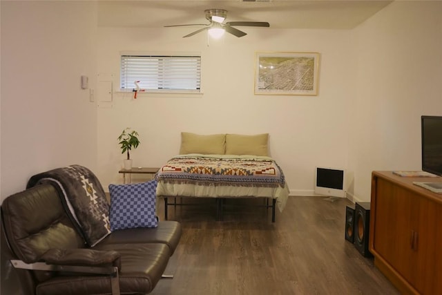 4701 Red River St Unit 104, Austin, TX 78751 - bedroom featuring wood finished floors, baseboards, and a ceiling fan