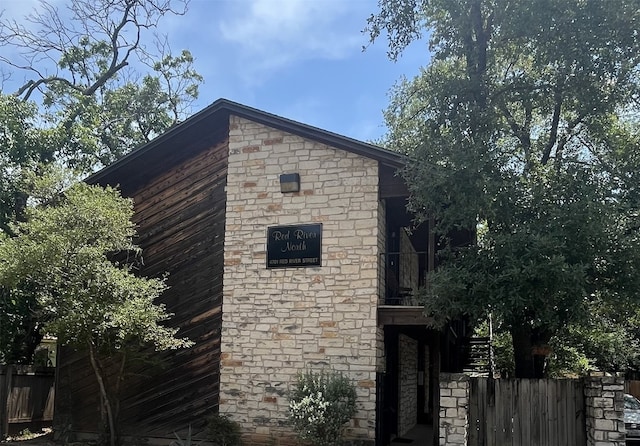 4701 Red River St Unit 104, Austin, TX 78751 - view of home's exterior with stone siding