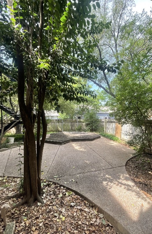 4701 Red River St Unit 104, Austin, TX 78751 - fenced backyard featuring a patio area