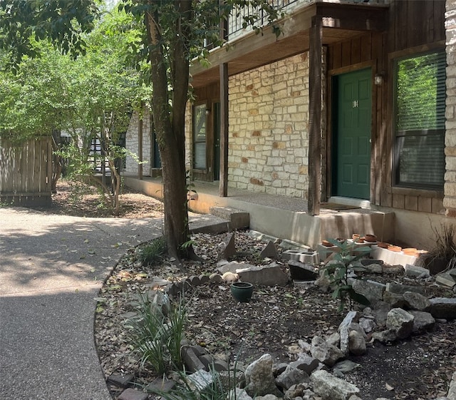 4701 Red River St Unit 104, Austin, TX 78751 - view of home's exterior featuring stone siding