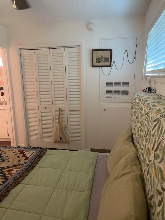 4701 Red River St Unit 104, Austin, TX 78751 - bedroom with a closet and tile patterned floors
