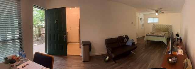 4701 Red River St Unit 104, Austin, TX 78751 - living area with wood finished floors and ceiling fan