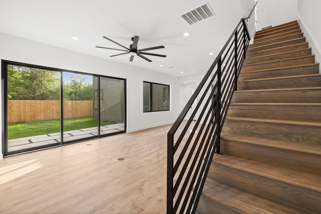 4407 Merle Dr Unit B, Austin, TX 78645 - stairway with ceiling fan, wood finished floors, recessed lighting, and baseboards