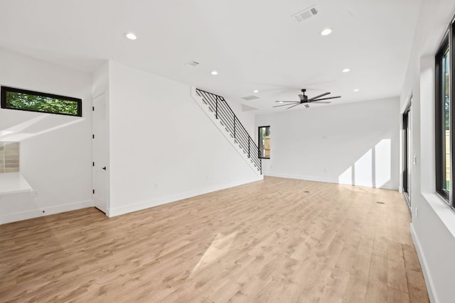 4407 Merle Dr Unit B, Austin, TX 78645 - unfurnished living room with plenty of natural light, stairway, recessed lighting, light wood-style floors, and a ceiling fan