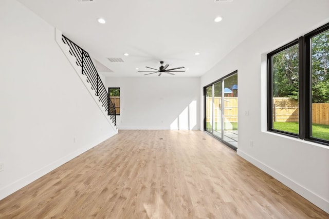 4407 Merle Dr Unit B, Austin, TX 78645 - unfurnished living room featuring baseboards, recessed lighting, light wood-style flooring, stairway, and a ceiling fan