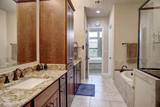 15208 Origins Ln, Austin, TX 78734 - full bath featuring tile patterned floors, a bath, vanity, a shower, and recessed lighting