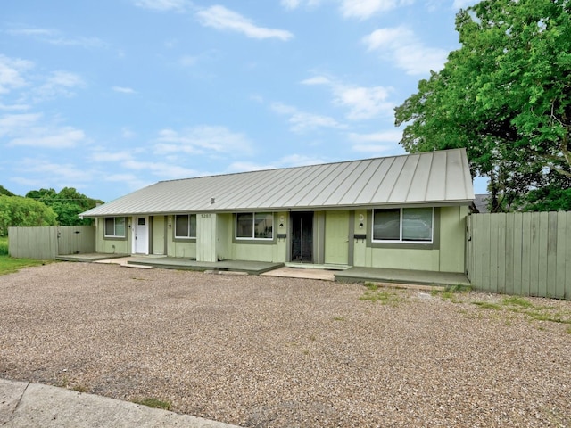5207 Tahoe Trl Unit A, B, C, & D, Austin, TX 78745 - view of front of property featuring driveway, covered porch, metal roof, and a standing seam roof
