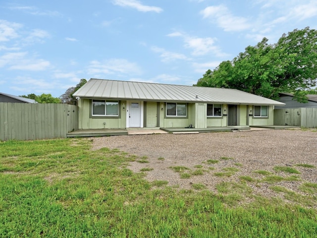 5207 Tahoe Trl Unit A, B, C, & D, Austin, TX 78745 - ranch-style home with covered porch and metal roof