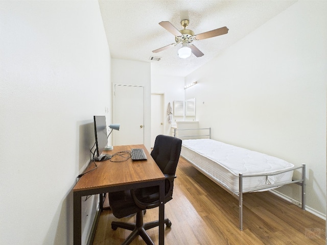 2905 Swisher St Unit 205, Austin, TX 78705 - office space featuring light wood-style flooring, ceiling fan, a textured ceiling, and baseboards