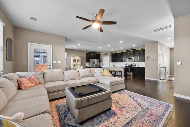 160 Thornless Cir, Buda, TX 78610 - living area with a ceiling fan, dark wood-style flooring, baseboards, and recessed lighting