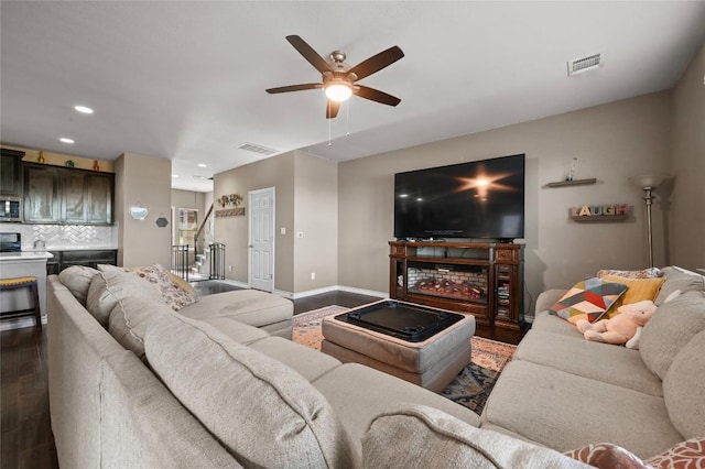 160 Thornless Cir, Buda, TX 78610 - living room with dark wood-style floors, ceiling fan, recessed lighting, and baseboards