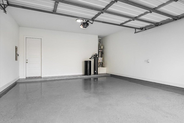 garage with a garage door opener, gas water heater, and baseboards