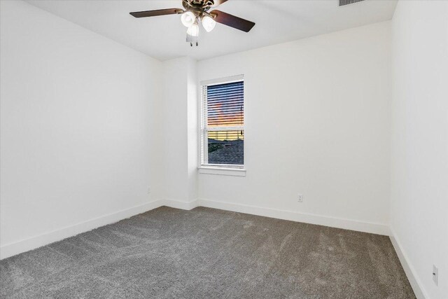 301 Jeffrey David Ln W, Austin, TX 78717 - spare room featuring carpet flooring, baseboards, and a ceiling fan