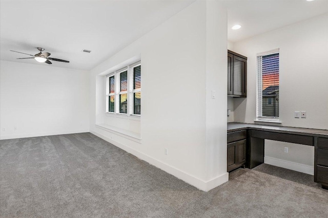 301 Jeffrey David Ln W, Austin, TX 78717 - spare room featuring carpet, built in study area, a ceiling fan, and recessed lighting