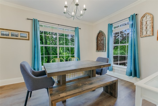 108 Tumbleweed Trl, Austin, TX 78733 - dining room with a chandelier, wood finished floors, plenty of natural light, ornamental molding, and baseboards