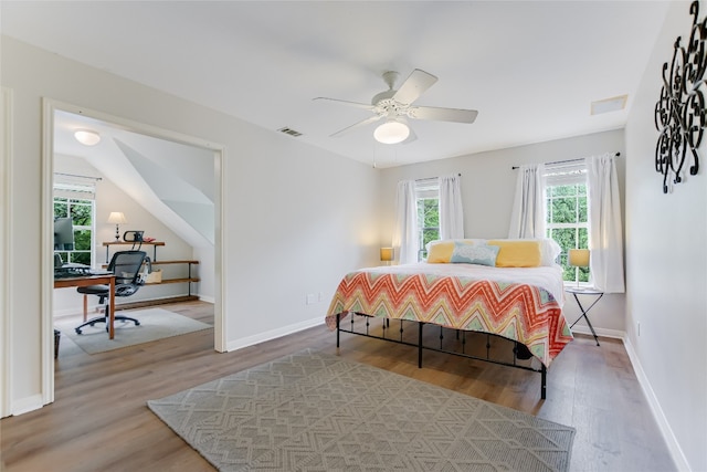 108 Tumbleweed Trl, Austin, TX 78733 - bedroom featuring wood finished floors, an office area, baseboards, and ceiling fan