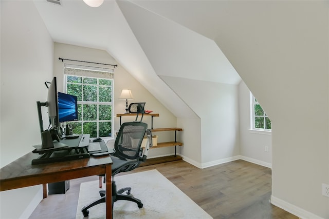 108 Tumbleweed Trl, Austin, TX 78733 - office space with wood finished floors, vaulted ceiling, and baseboards